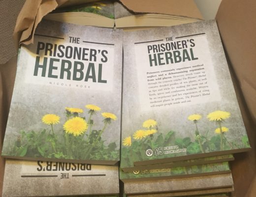 A box of The Prisoner's Herbal books
